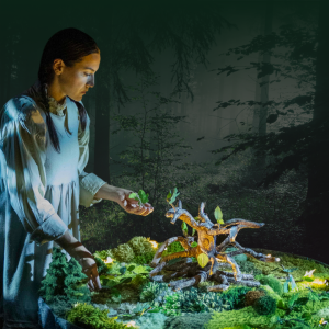 A woman in a pale dress arranges plants and gently plants the seed on a moss-covered table with a tree-shaped structure, set in a mystical, dimly lit forest aglow with enchanting lights.