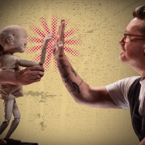 A person with glasses and tattoos high-fives a fabric puppet held by another, celebrating support in the final act, with a red burst pattern in the background.